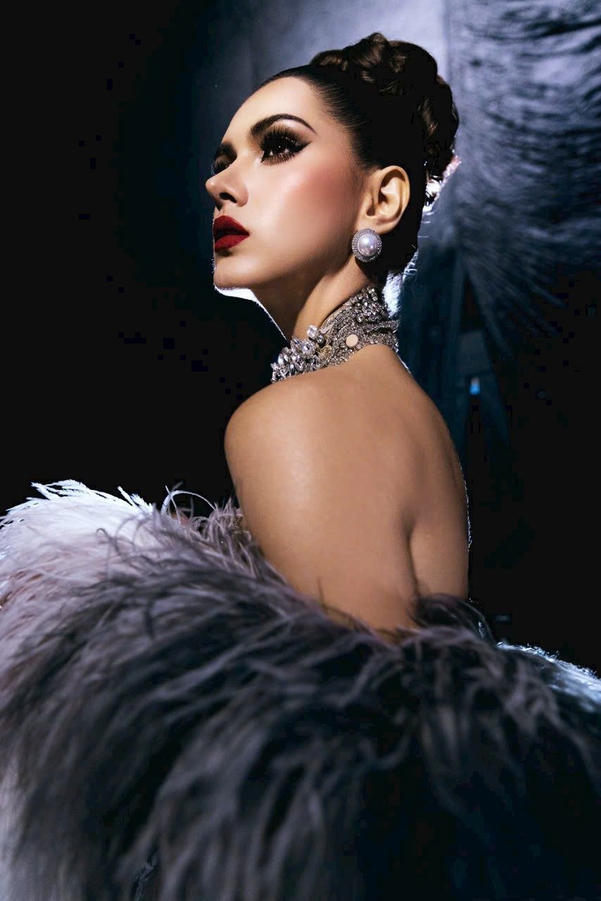 Diwali party makeup and hair by KINKAY in Ho Chi Minh City: smoky eye, red lip and a sleek updo with statement jewellery